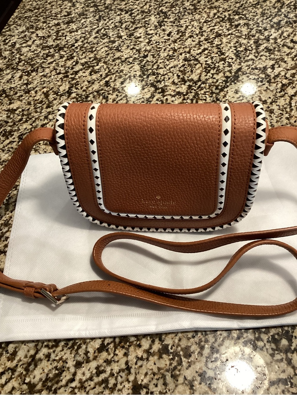 kate spade Tan Leather Crossbody with White and Black Trim. EUC!